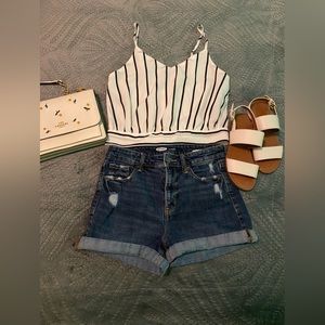 Cropped tank top, tie back.